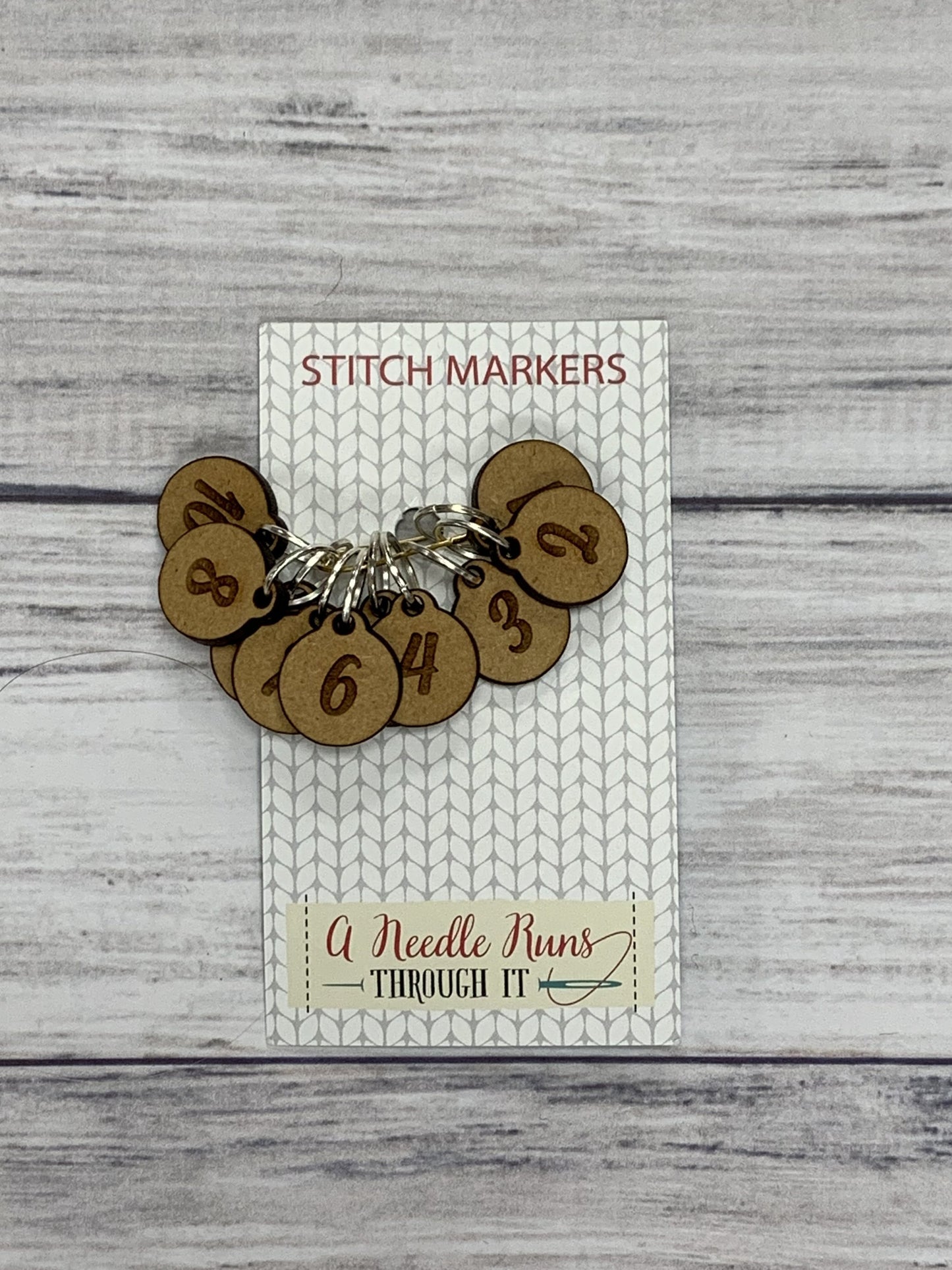 Wooden Ring Stitch Markers by A Needle Runs Though It