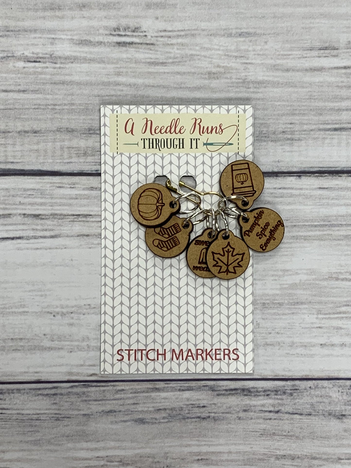 Wooden Ring Stitch Markers by A Needle Runs Though It