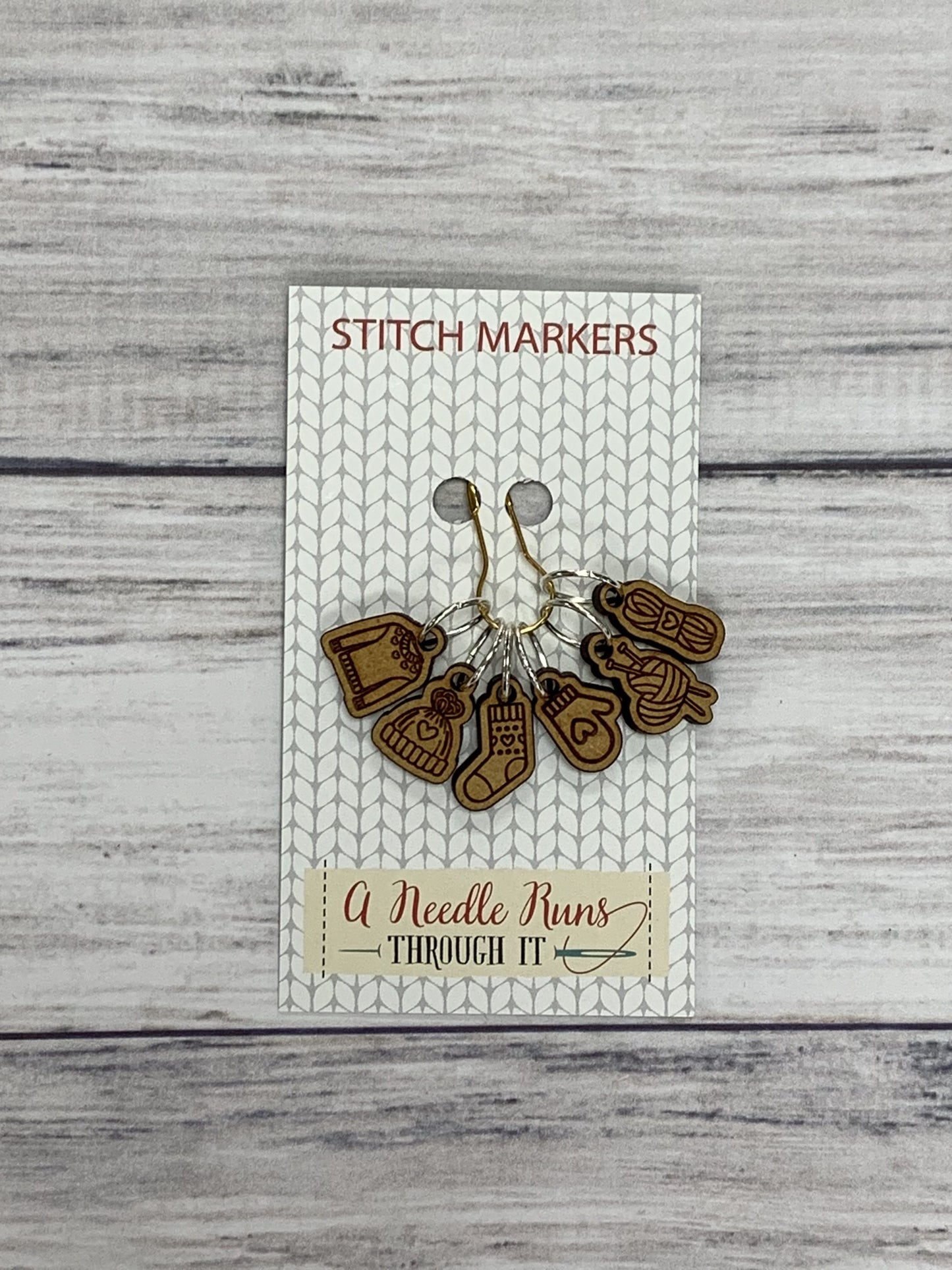 Wooden Ring Stitch Markers by A Needle Runs Though It