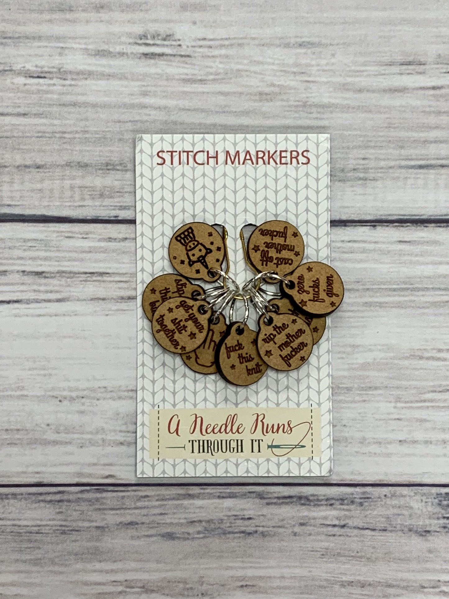 Wooden Ring Stitch Markers by A Needle Runs Though It