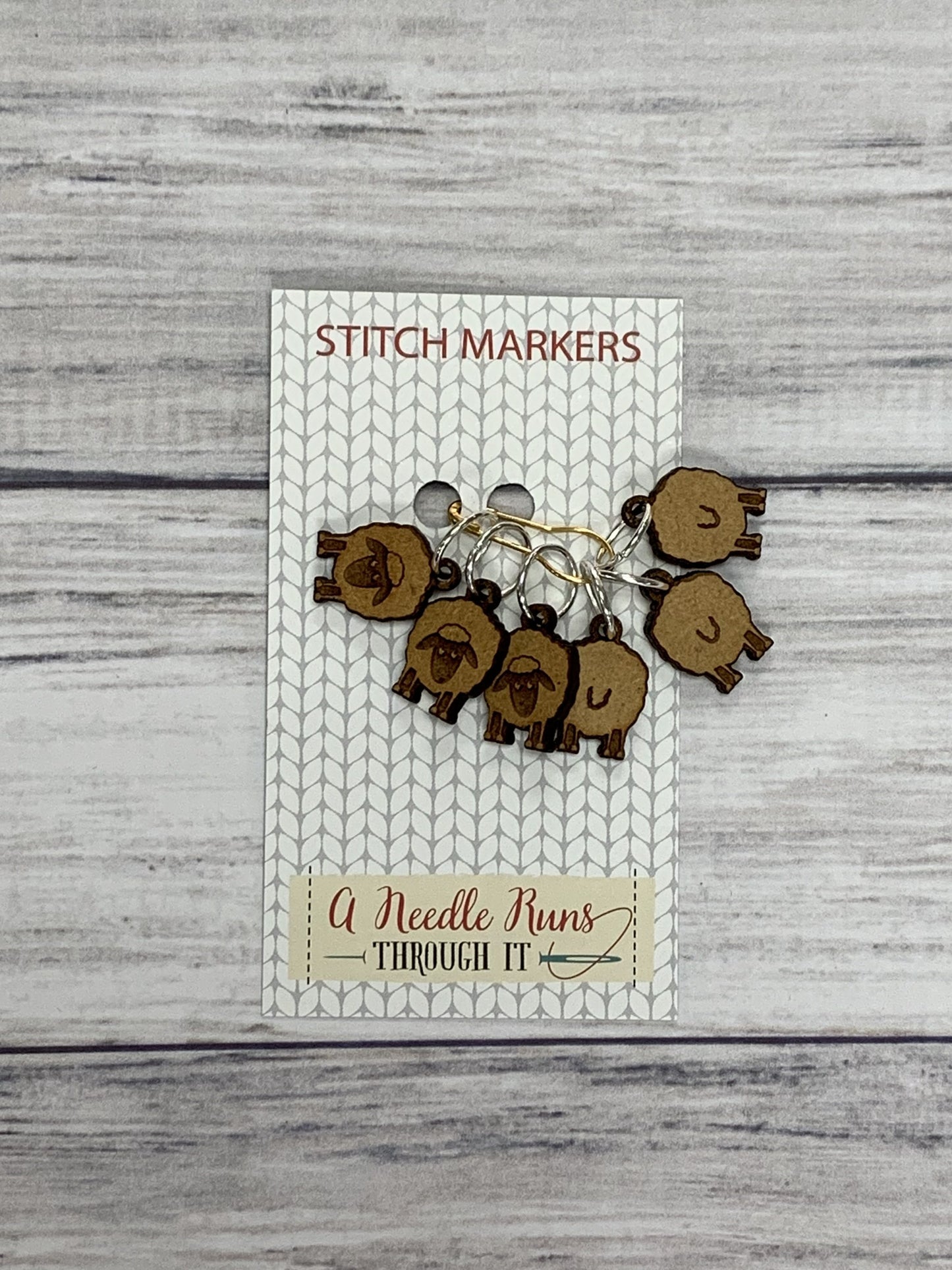 Wooden Ring Stitch Markers by A Needle Runs Though It