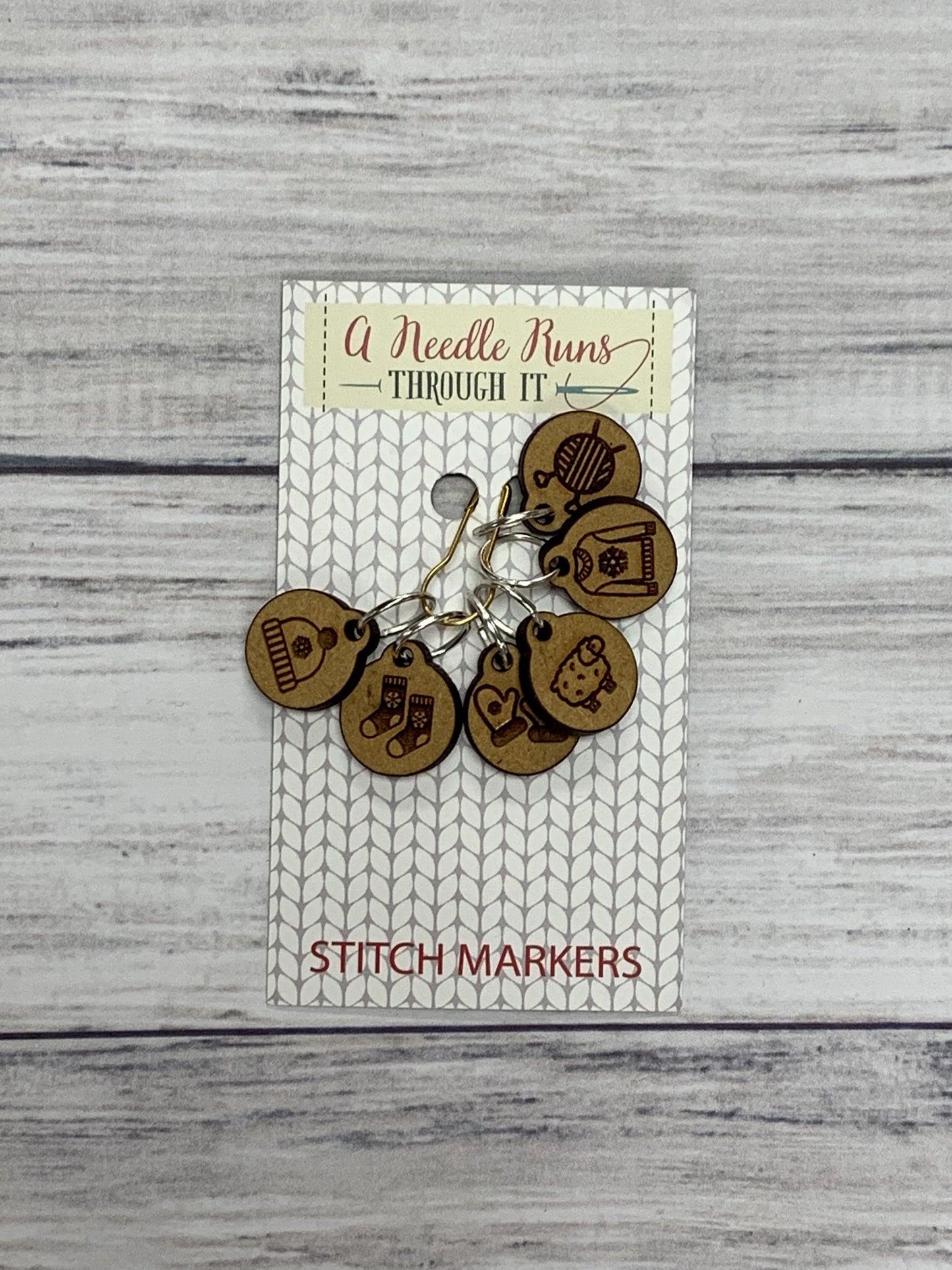 Wooden Ring Stitch Markers by A Needle Runs Though It